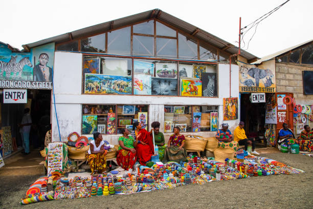 Arusha City Guide – women selling handmade Maasai beaded jewelry and traditional African crafts at Maasai Market in Arusha, Tanzania